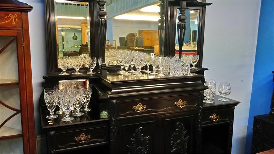 A suite of thirty Edinburgh cut crystal glasses and a set of six Royal Doulton glasses.
