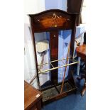 An oak umbrella stand.