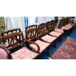 A set of six reproduction mahogany chairs comprising of six single and two carvers. (8)