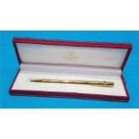 A boxed Must de Cartier pen.