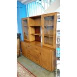 An elm Ercol display unit. 155cm