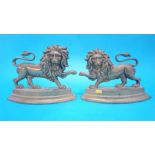 A pair of Victorian brass lion door stops.