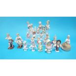 A collection of twenty one Continental porcelain figure heads and a small pair of Continental