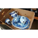 Box of blue and white china.