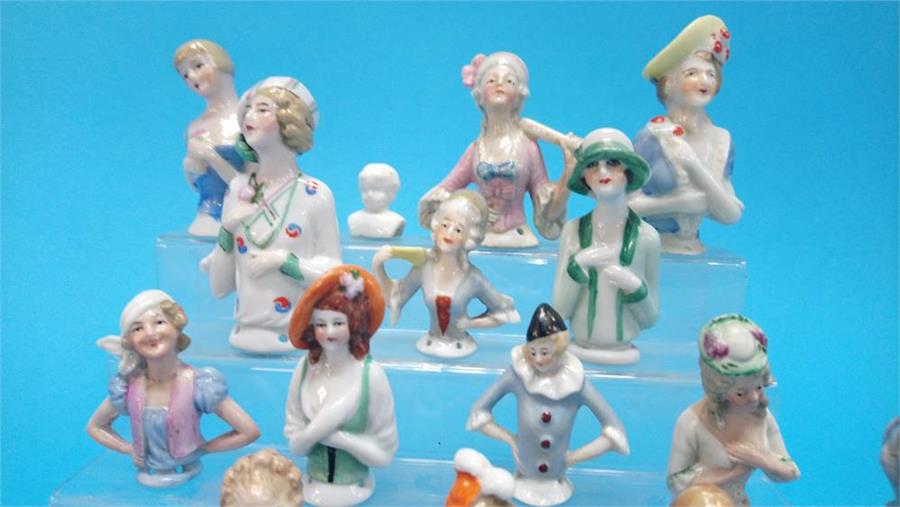 A collection of twenty one Continental porcelain figure heads and a small pair of Continental - Image 3 of 6