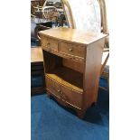 A yew wood bowfront side cabinet. 53cm wide
