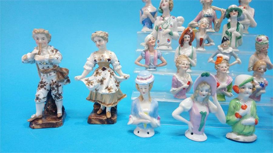 A collection of twenty one Continental porcelain figure heads and a small pair of Continental - Image 2 of 6