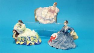 Three Royal Doulton figurines of Ladies.