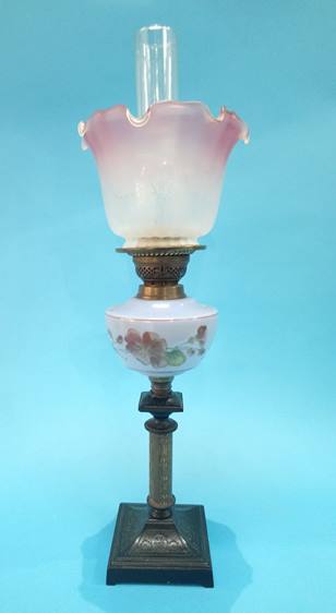 A Victorian oil lamp.