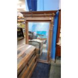 A large Continental oak framed mirror. 103cm x 151cm