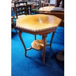 An Edwardian mahogany occasional table.