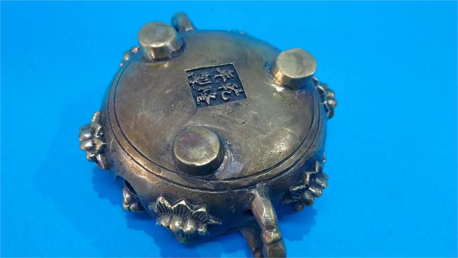 A small Chinese bronze censor, with seal mark to base. 5 cm high 9 cm diameter - Image 3 of 4