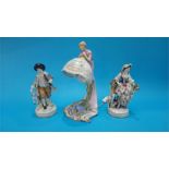 A pair of Continental porcelain figures of a gallant and a lady, blue marks in underglaze blue and a