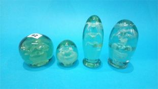 Four Victorian green glass 'flower' dumps.