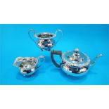 A silver plated three piece tea set.