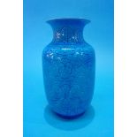 A Chinese porcelain vase on a turquoise ground, decorated with flowers, marks to base. 18cm high
