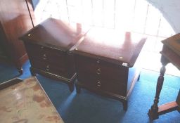A pair of Stag bedside drawers.