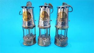Three Miners lamps.