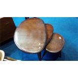 An Ercol Pebble nest of three tables.