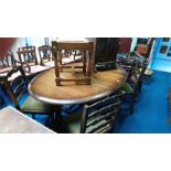 An oak gateleg table and four chairs.