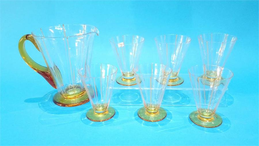 A seven piece glass juice set.