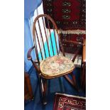 An Ercol rocking chair.