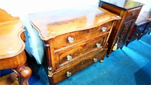 A Continental walnut chest of three long drawers, with glass handles. 62cm wide