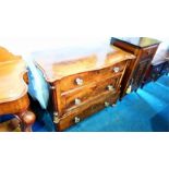 A Continental walnut chest of three long drawers, with glass handles. 62cm wide