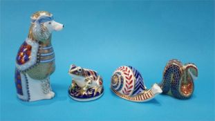 Four Royal Crown Derby paperweights to include 'French Poodle', 'Frog', 'Snail' and 'Snake'.