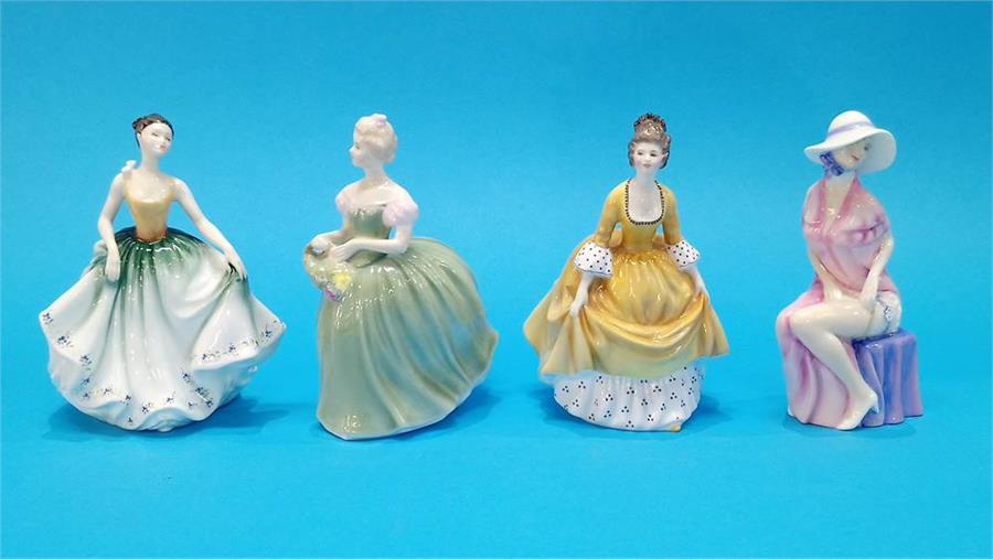 Four Royal Doulton figurines of Ladies.