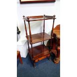 A 19th century rosewood three tier what not with single drawer. 53cm wide