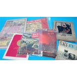 Various books and ephemera in one tray.