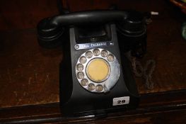 A Bakelite telephone with cheese drawer