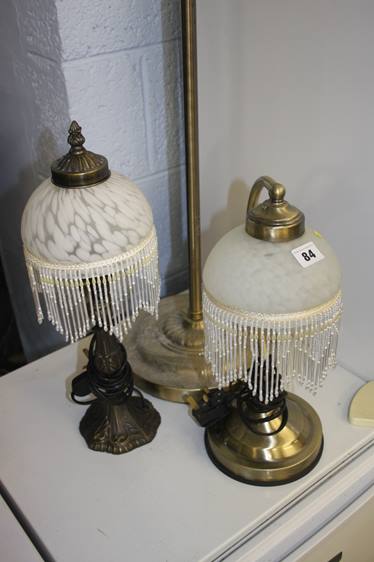 Two table lamps and a floor lamp