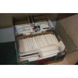 Two boxes of postcards