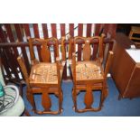 Four walnut chairs