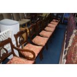 A set of eight reproduction mahogany dining chairs