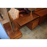 An unusual G Plan? teak dressing table with swivel mirror, circular mirror and four drawers