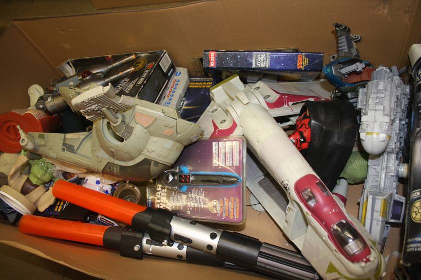 Two boxes of Star Wars toys