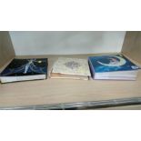 Three postcards albums