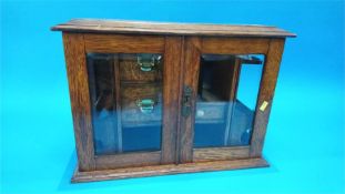 An oak Smoker's cabinet