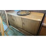 An Ercol Golden Dawn sideboard