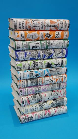 11 volumes by Arthur Ransome, published by Jonathan Cape, with dust covers