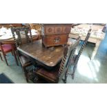 A small oak refectory table with a set of five oak barley twist chairs