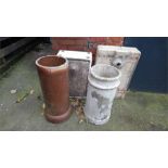 Two ceramic sinks and two chimney pots