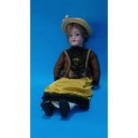 An Armand Marseille bisque headed doll, stamped 390, 6 1/2