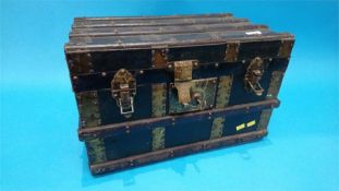 A miniature doll's trunk or vanity case, with key. 38cm wide