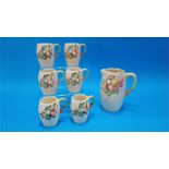 An A.J. Wilkinson seven piece drinks set