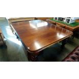 A Victorian mahogany wind out dining table, with turned baluster fluted and reeded legs. 326cm