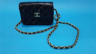 A Ladies evening bag labelled Chanel